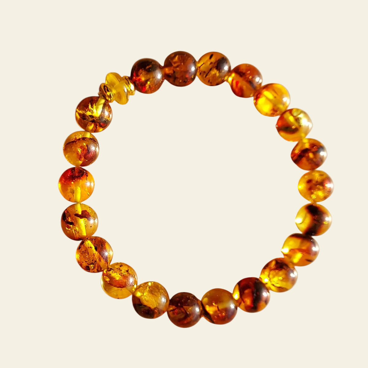 Bracelet ambre baltique miel certifié montage élastique - Madame de Marsac